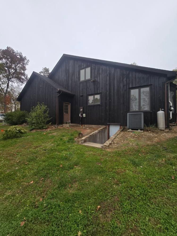 Dark siding, natural setting